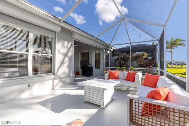 view of patio featuring outdoor lounge area and a lanai