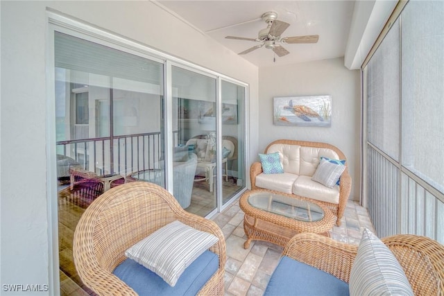 sunroom / solarium with ceiling fan