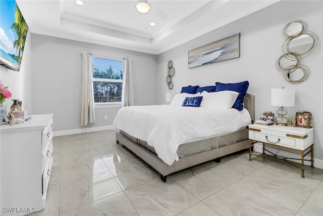 bedroom featuring ceiling fan, a raised ceiling, and crown molding