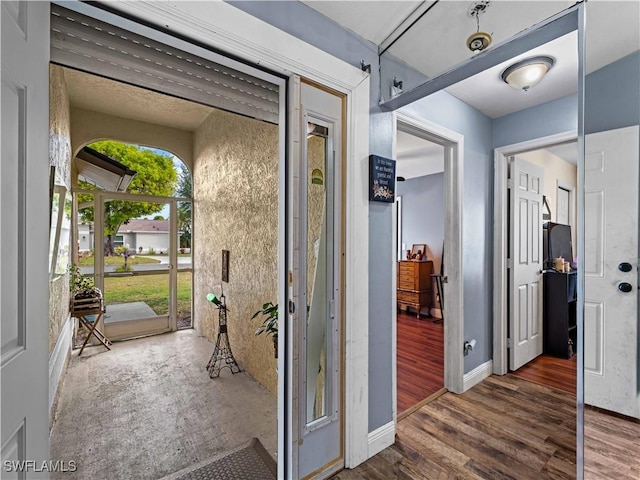 hall featuring dark hardwood / wood-style flooring