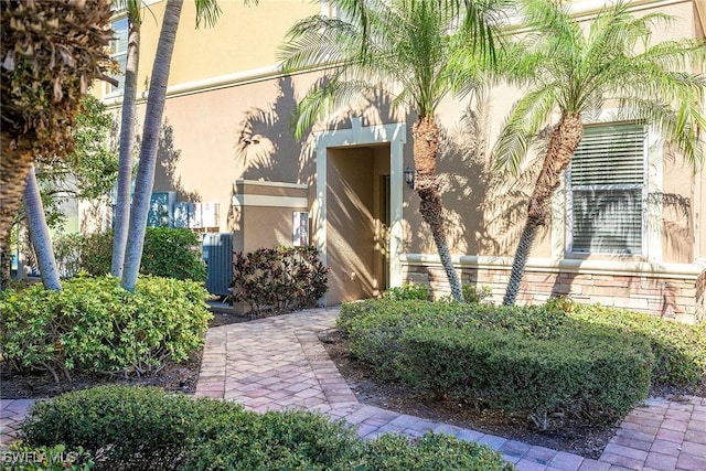 doorway to property with cooling unit