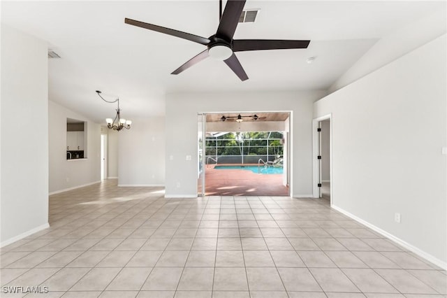 unfurnished room with light tile patterned floors, ceiling fan with notable chandelier, and vaulted ceiling