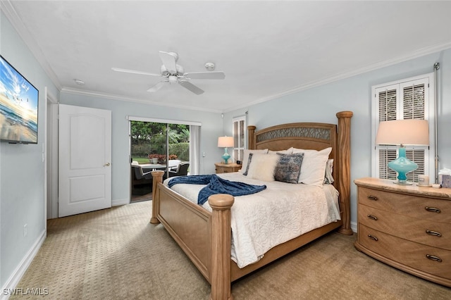 carpeted bedroom featuring ceiling fan and ornamental molding