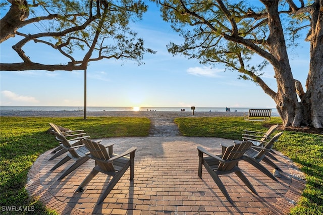 view of patio featuring a water view