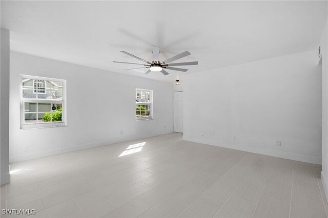 spare room with ceiling fan