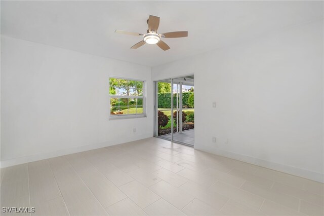 unfurnished room with ceiling fan