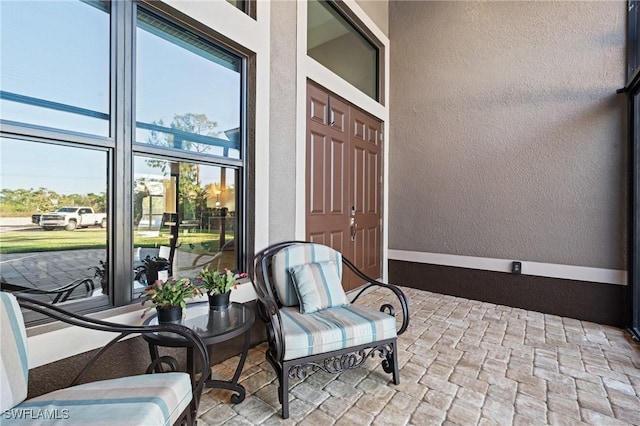 view of exterior entry featuring stucco siding