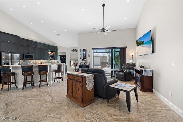 living room featuring marble finish floor, baseboards, high vaulted ceiling, and a ceiling fan