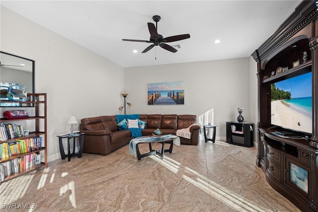 living room with a ceiling fan, recessed lighting, marble finish floor, and baseboards