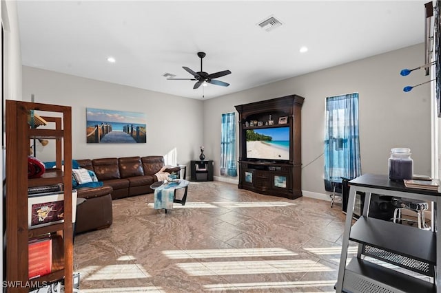 living area with baseboards, visible vents, ceiling fan, and recessed lighting