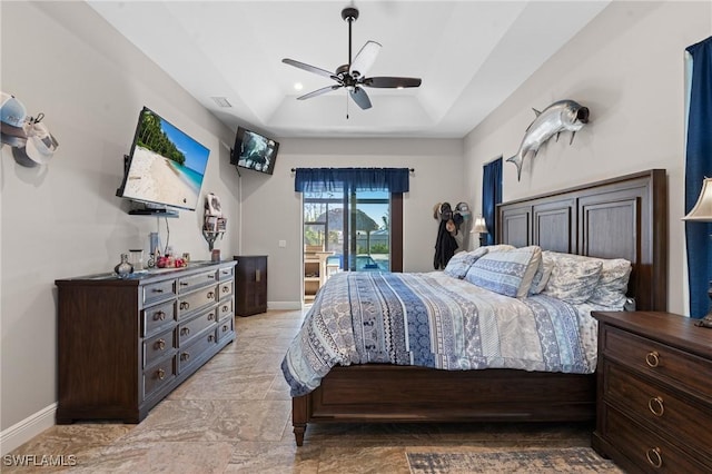 bedroom featuring access to exterior, recessed lighting, a raised ceiling, a ceiling fan, and baseboards