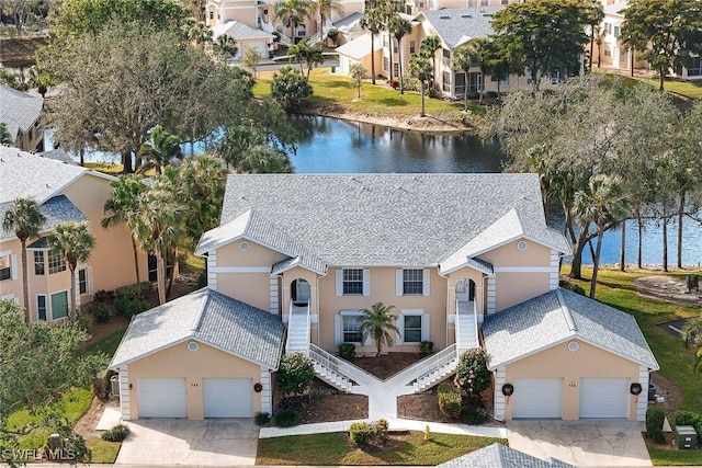 bird's eye view with a water view