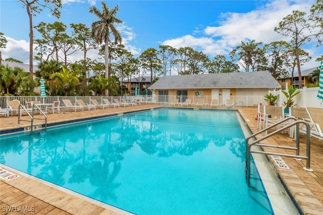 view of swimming pool featuring a patio area