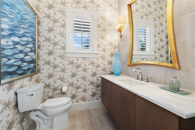 bathroom with vanity and toilet