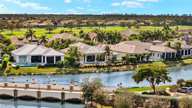 birds eye view of property featuring a water view