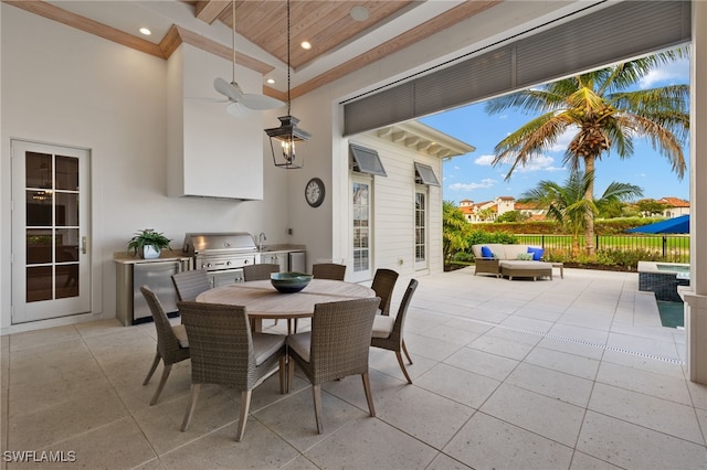 view of patio / terrace with area for grilling, sink, and an outdoor hangout area