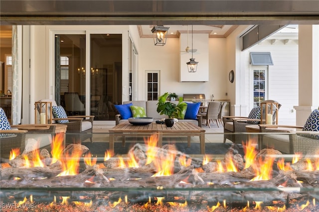 view of patio / terrace with a fire pit