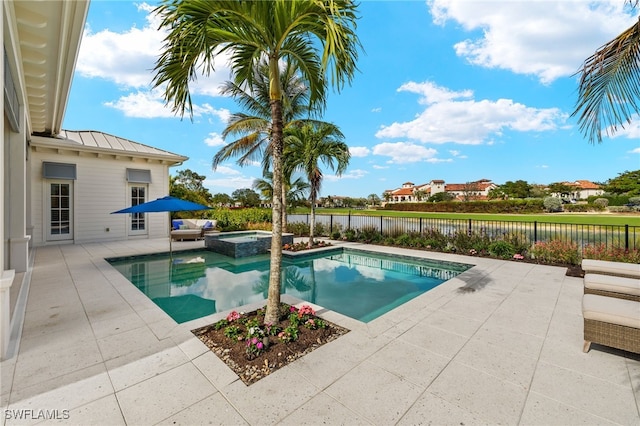 view of pool featuring an in ground hot tub and a patio area