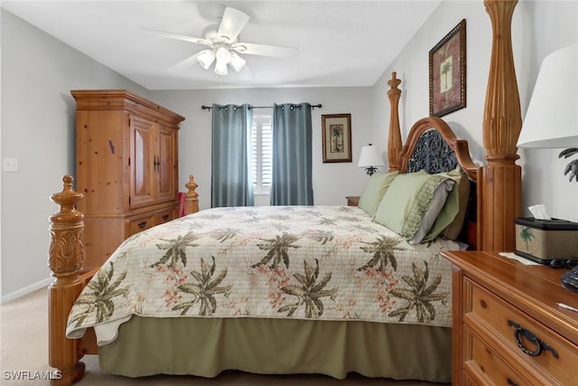 bedroom featuring ceiling fan and light colored carpet