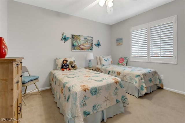 bedroom featuring ceiling fan and light colored carpet