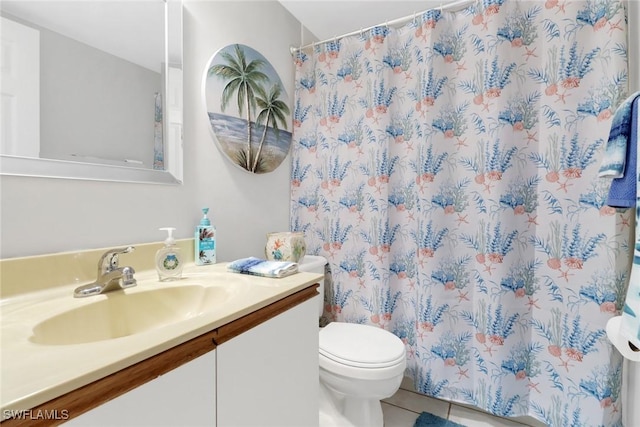 bathroom featuring tile patterned floors, vanity, toilet, and a shower with curtain