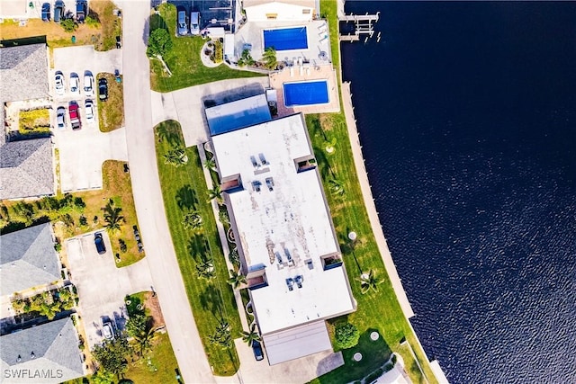 drone / aerial view with a water view