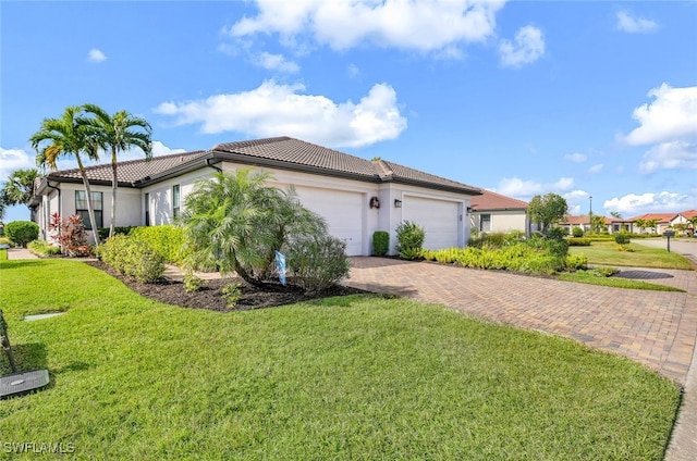 view of property exterior with a yard and a garage