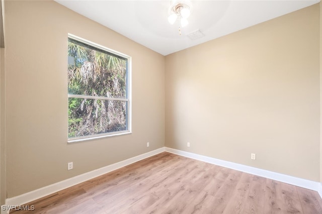 empty room with light wood-type flooring