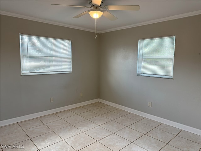 unfurnished room featuring plenty of natural light, crown molding, and ceiling fan