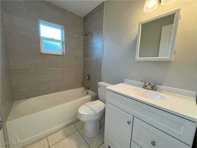 full bathroom featuring tile patterned flooring, vanity, toilet, and tiled shower / bath