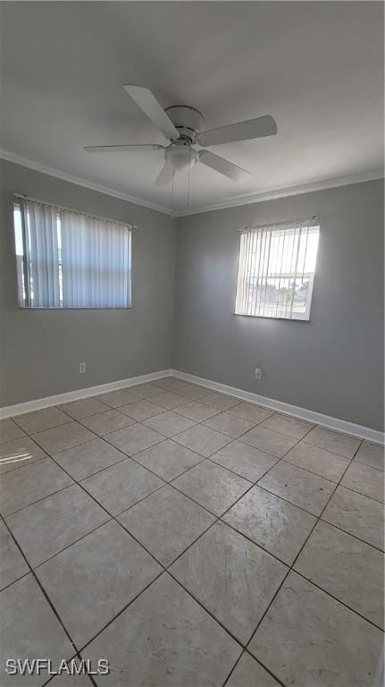 unfurnished room featuring light tile patterned floors, ceiling fan, and ornamental molding