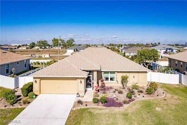 ranch-style house with a front lawn and a garage