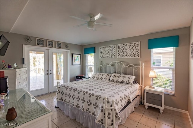 bedroom featuring ceiling fan, french doors, access to outside, multiple windows, and light tile patterned floors