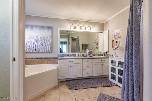 bathroom with tile patterned flooring, vanity, crown molding, and a washtub