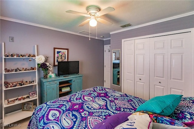 bedroom featuring a closet, ceiling fan, and crown molding