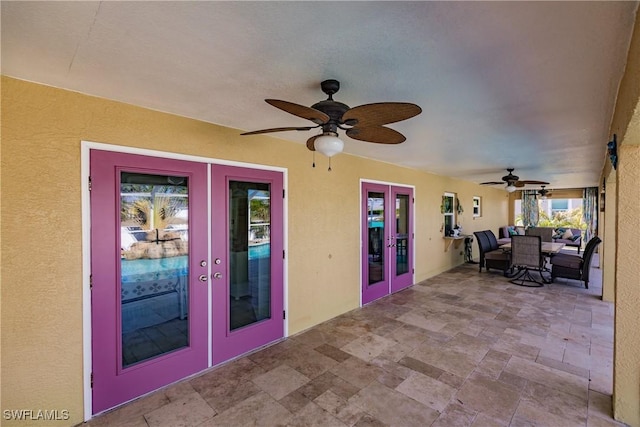 view of patio / terrace featuring french doors