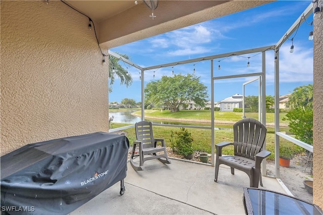 view of patio / terrace featuring a water view