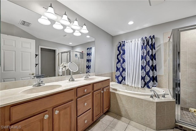 bathroom with tile patterned floors, vanity, and plus walk in shower