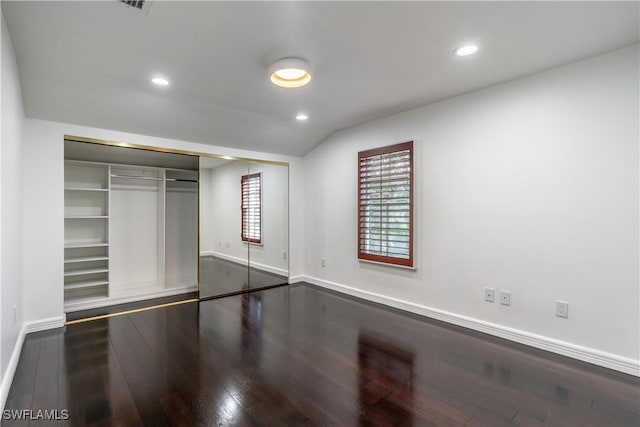 1160 8th St S, Naples, FL 34102 - unfurnished bedroom featuring dark wood-style floors, recessed lighting, baseboards, and a closet