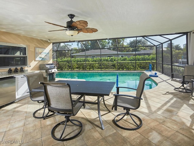 view of pool featuring a lanai, ceiling fan, area for grilling, and a patio area