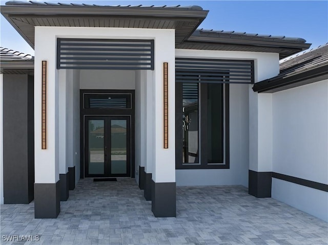 doorway to property with french doors