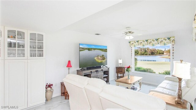 living room with ceiling fan