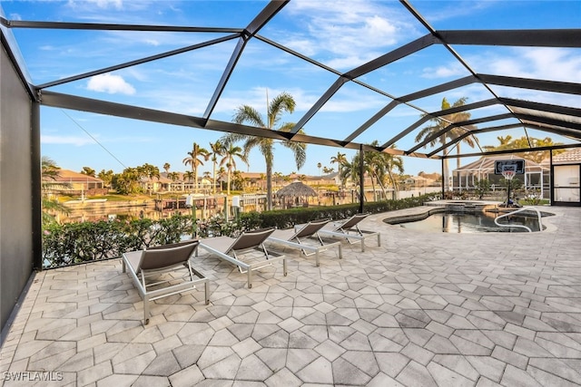 view of patio featuring a lanai