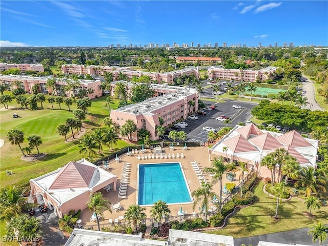 170 Turtle Lake Ct Unit 211, Naples, FL 34105 - aerial view of skyline and a pool
