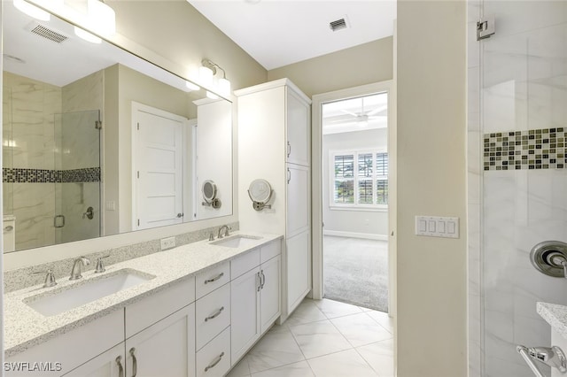 bathroom with vanity and walk in shower