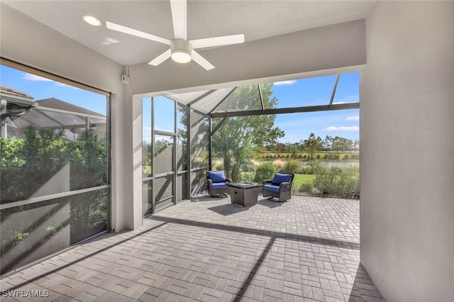 sunroom with a water view