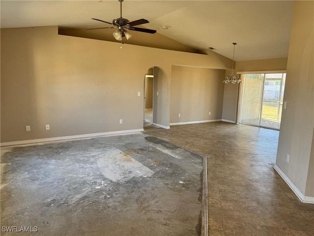 empty room with ceiling fan with notable chandelier and lofted ceiling