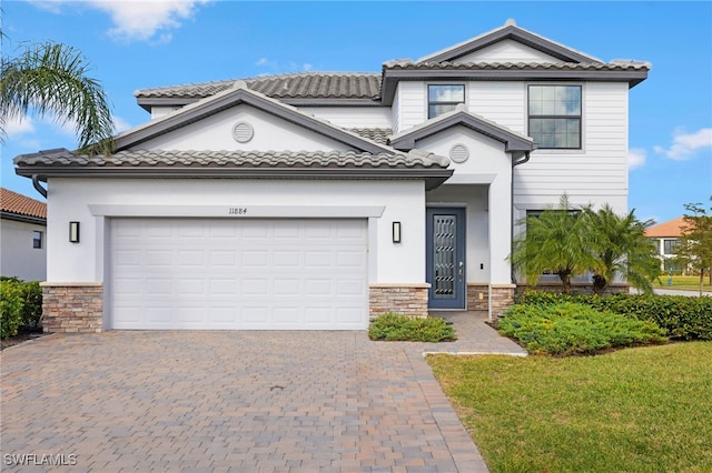 view of front of home with a garage