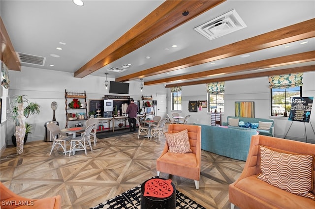 living room with beam ceiling, light parquet floors, and a healthy amount of sunlight