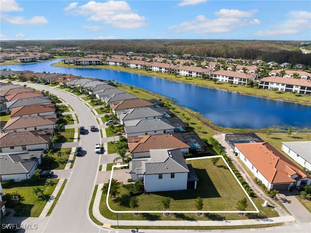 drone / aerial view featuring a water view